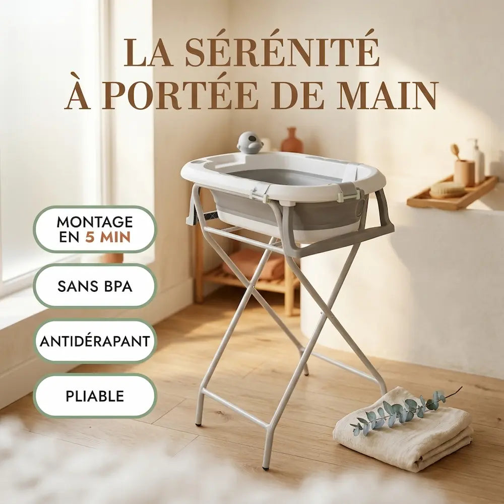 Baignoire bébé sur pied inox pliable avec vidange installée dans la salle de bain